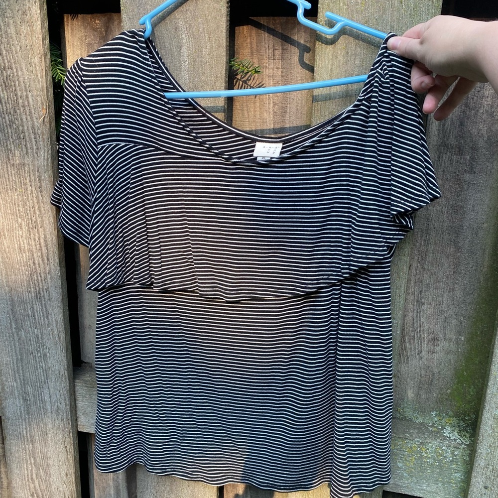 Stretching off the shoulder stripped shirt